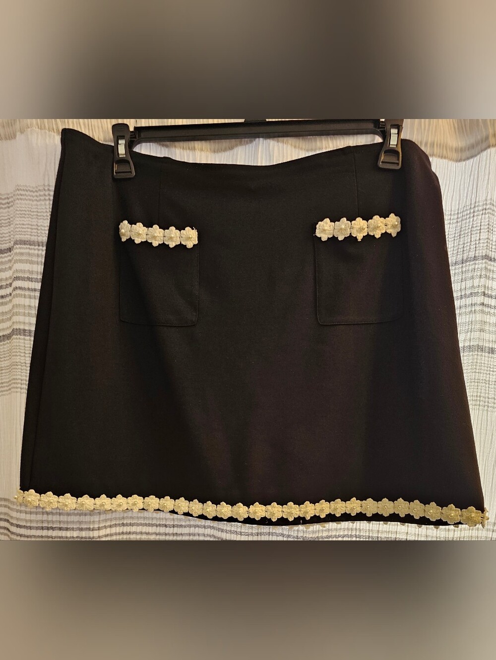 CeCe Black Mini Skirt with Crochet White Floral w/pearl Bead Around Hem.
